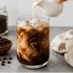 Glass of cold brew french press ice and milk