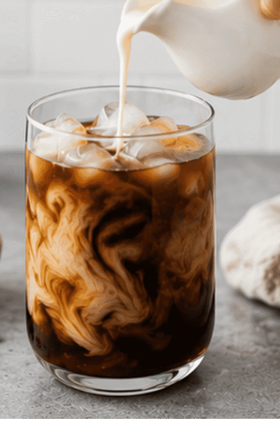 Glass of cold brew french press ice and milk