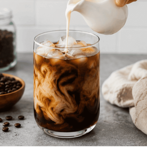 Glass of cold brew french press ice and milk